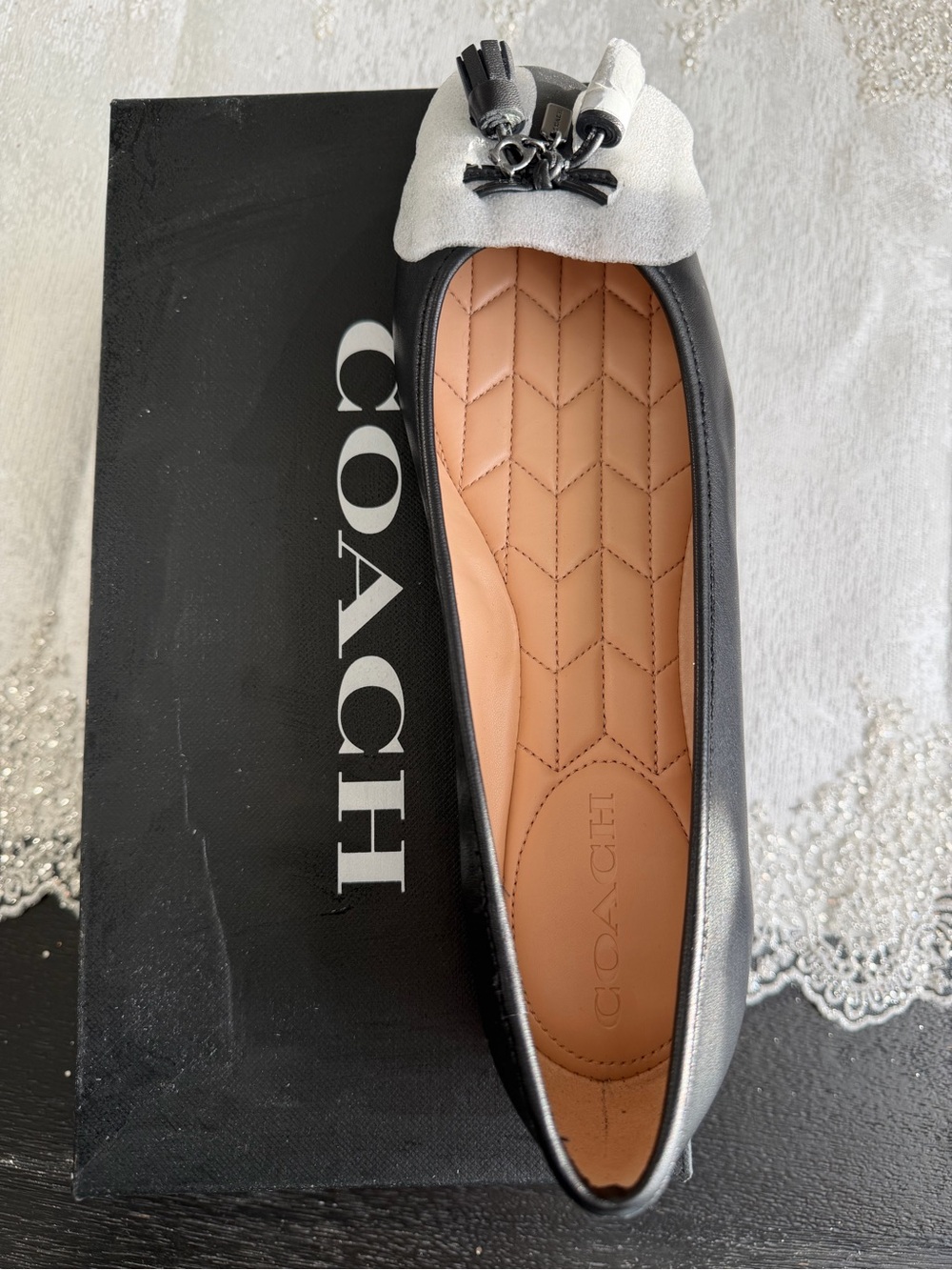 Coach Black Leather Tassel Ballet Flat with White Accent
